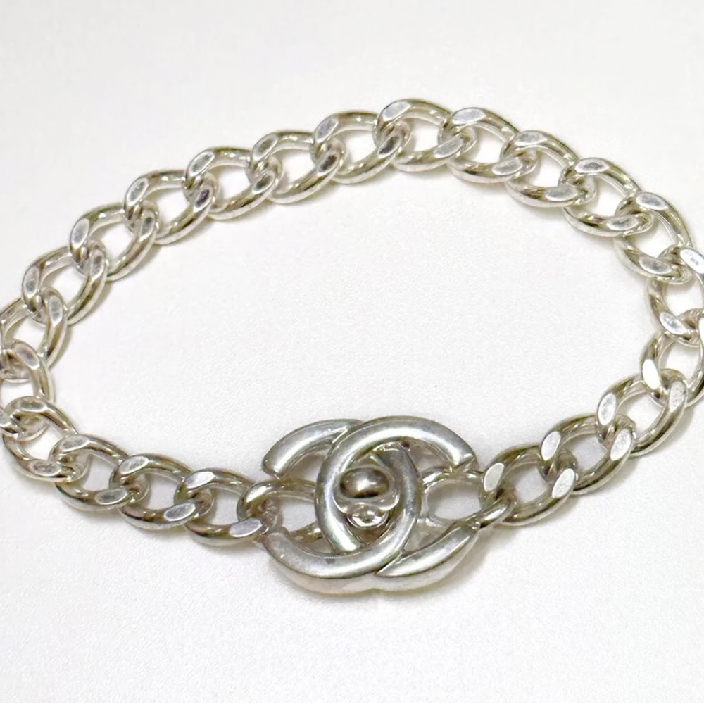 CHANEL CC Logo Turn Lock  7” Bangle Bracelet in Silver Metal tone